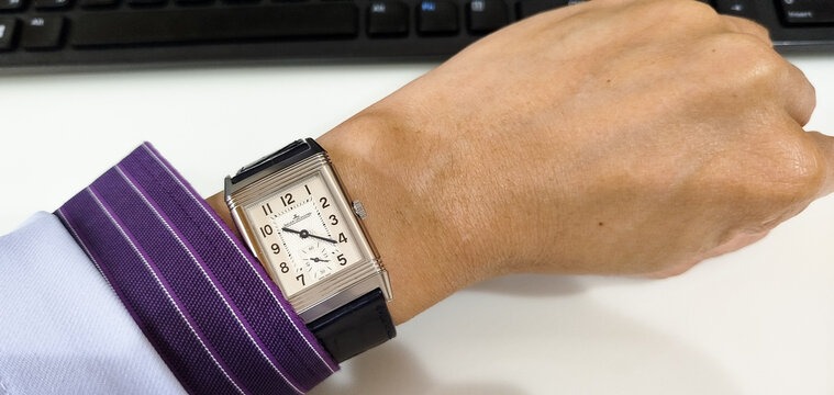 BANGKOK, THAILAND - MAY 25 : Jaeger leCoultre Reverso model, iconic model, mono face with medium size, alligator strap wear on wrist in Bangkok, Thailand, on May 25, 2026.