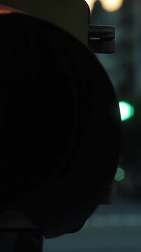 Traffic Light Transitioning To Green With Blurred Night Traffic Background - 4K Vertical