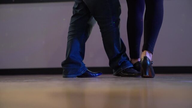 Argentine Tango Dancers Feet on Dance Floor