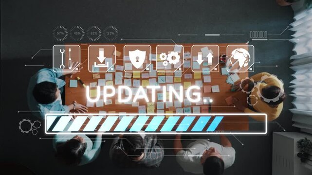A team works together in a modern office setting, utilizing sticky notes and digital tools to update and manage their project progress effectively. Raster