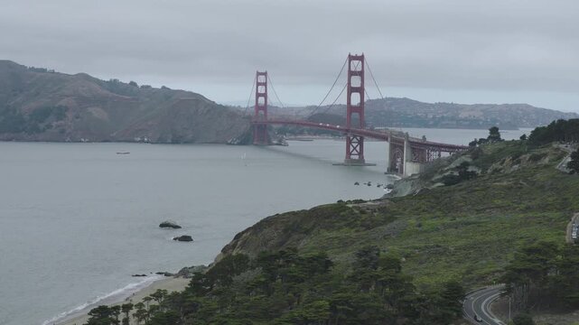 Beautiful Golden Gate Bridge From Baker Beach, Sandy Cove, Overcast Day - Aerial Shot