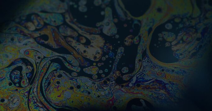 Gasoline paint. Soap oil swirl. Colorful liquid chaotic motion chemical blur texture. Mix drop water emulsion abstract background.