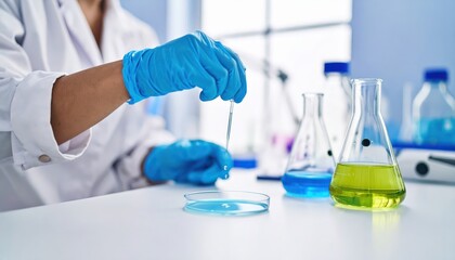 Fototapeta premium Scientist meticulously adds liquid drop to petri dish in laboratory research