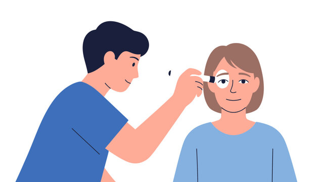 Optometrist examining patient's eye with penlight