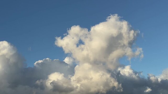 Time lapse of Cumulus congestus (also known as towering cumulus). in Waikiki, Honolulu, Oahu, Hawaii. Trade winds. Cumulus clouds are low-level clouds