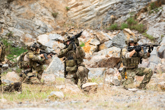 Special forces team establishes defensive positions during a military field exercise