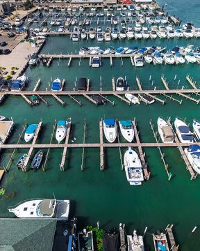 Marina aerial view with many boats docked at Detroit river