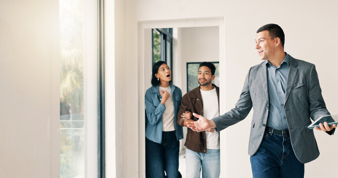 Couple, relocation and surprise with realtor in new home for opportunity, sale or viewing. Bond approval, mortgage loan and showing with shocked people in real estate development for purchase