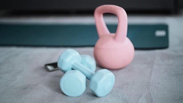 dumbbell and kettlebell at home background