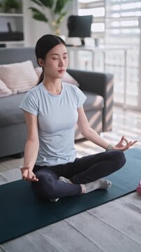 Young Asian woman meditation yoga at home, Health and mental concept