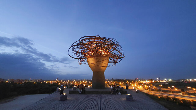 Manzanares Lady (Dama del Manzanares) sculpture by Manolo Vald&eacute;s in Parque Lineal del Manzanares after sunset on June 25, 2026 in Madrid, Spain.