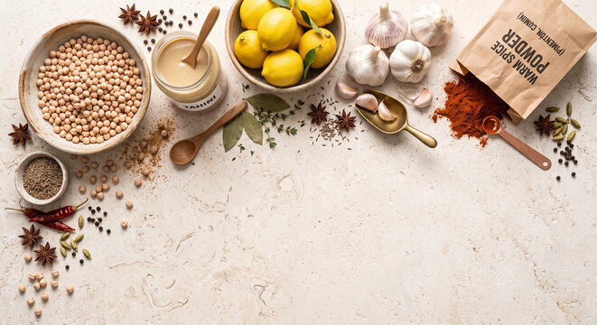 Dried chickpeas and tahini on authentic Jerusalem limestone stone, 