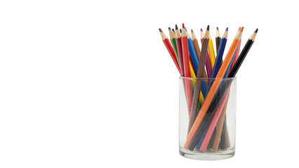Fototapeta premium A collection of sharpened colored pencils standing upright in a clear glass container isolated against a solid black background, for contrast