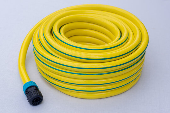 New Yellow Garden Hose with Connector Isolated on White