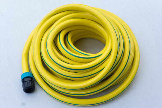 Yellow Garden Hose with Connector Isolated on White Background