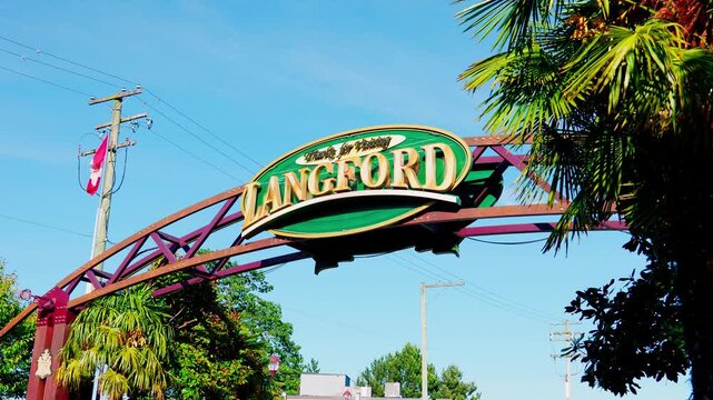 Langford, BC, Canada &ndash; July 1, 2026: Welcoming city arch sign on Goldstream Avenue