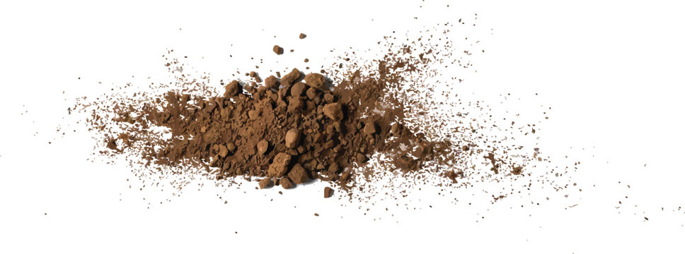 Brown dirt clods and fine particles scattered against 