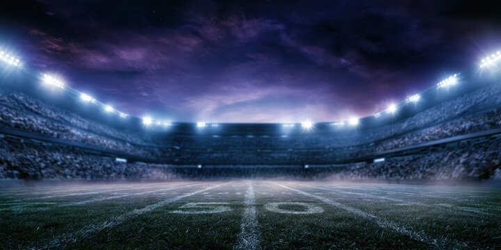 Empty american football field at night, view from the 50 yard line looking towards the stadium seating, bright floodlights and misty atmosphere