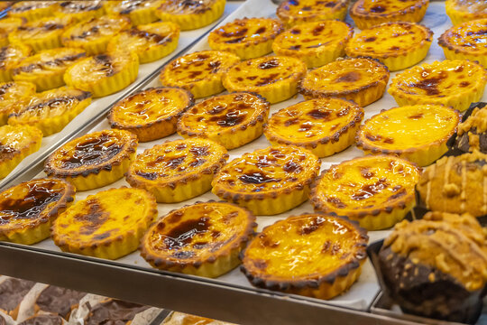 Several freshly baked Portuguese custard tarts