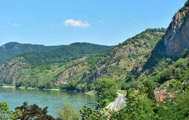 Scenic landscape of the Danube Valley near Dürnstein in the Wachau region, Austria with terraced vineyards and rocky hills. © E.R.Dora