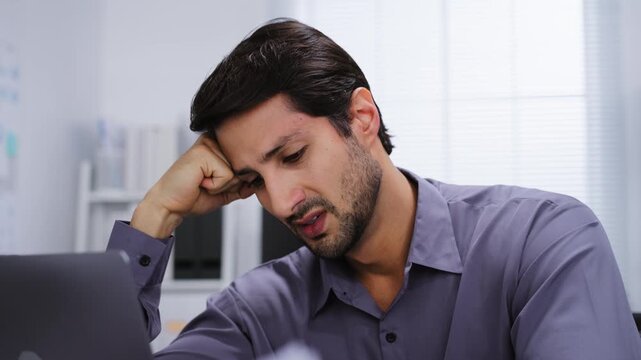 Overwork stress workload angry burnout office employee reacts with frustration reviewing business paperwork and document, upset and exhausted as pressure and boredom from repetitive office tasks