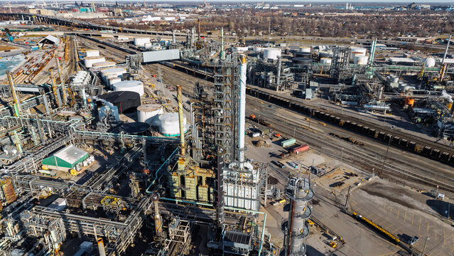 Oil refinery industrial complex producing fossil fuel energy