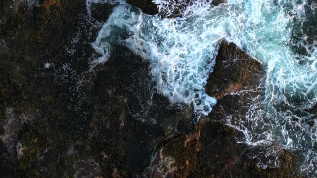 Breaking Ocean Waves Crash Against The Rocky Shoreline Along Atlantic Road In Gloucester, Massachusetts, USA. Aerial Slow-Motion Shot