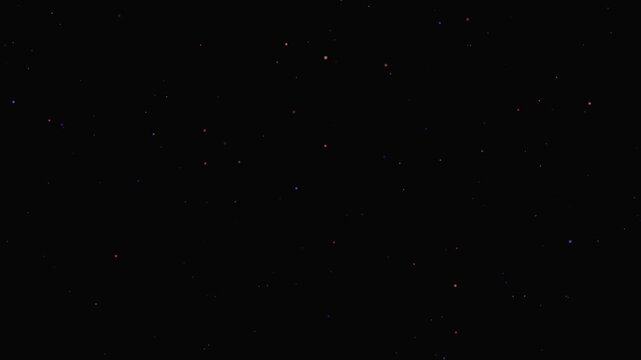 Colorful dust particles floating in dark space creating seamless looping animation overlay pattern