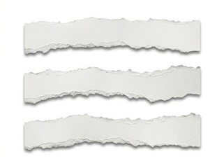 Fototapeta premium Three pieces of white torn paper strips with rough edges for design projects and scrapbooking layouts on a blank surface isolated on white background