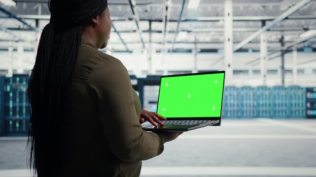 Data center engineer runs equipment checkups in a data center, supporting equipment checkups, infrastructure maintenance, disaster recovery and reliable server infrastructure management.
