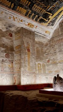 Broken stone sarcophagus of an ancient Egyptian pharaoh Ramesses inside a royal burial chamber of royal tomb KV 9, Valley of the Kings, Luxor, Egypt.