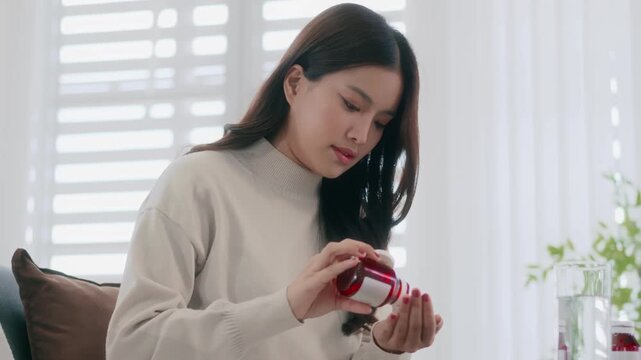 woman take or eat medical pill for treatment healthcare