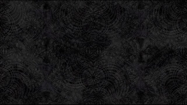 Black textured background with pattern.