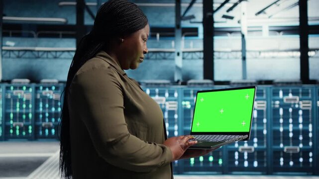 Woman engages with a digital wall as online previews communicate streaming videos, social media videos, personalized recommendations and digital entertainment access.