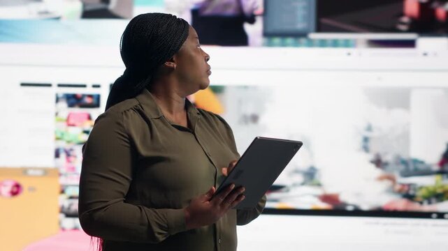 Data center technician works inside a data center to support AI development, machine learning, automation workflow and organized technical operations within a practical data center workflow.