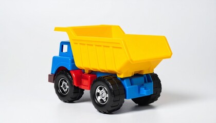 Fototapeta premium Bright plastic toy dump truck with vivid primary colors
