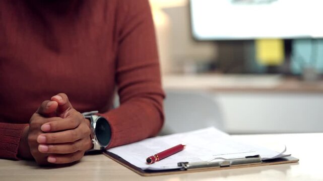 Close-up of a worried woman clasping her hands, expressing emotional distress, fear, and uncertainty. Useful for illustrating mental health issues, personal worries, low confidence, and emotional vuln