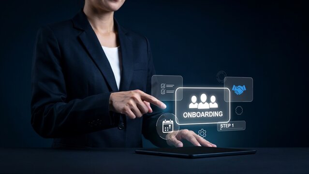 Businesswoman Pointing at Digital Onboarding Interface on Tablet Showing Step 1 and Team Icons