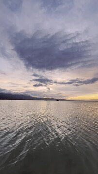 Calm Water Under Dramatic Sky