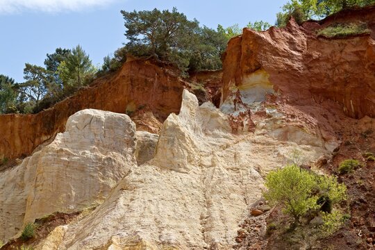 View of rock formations in the former old ochre mines of Colorado of Rustrel in the Luberon Natural Park, near Apt town in Provence. France. Europe.