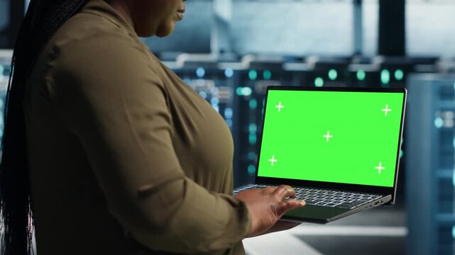 Engineer checks hardware stability in a data center, supporting hardware checks, system stability, network monitoring and reliable server infrastructure management.
