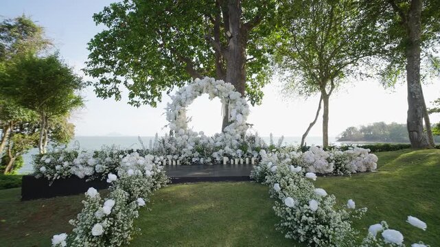 Decorated wedding arch ceremony garden.
