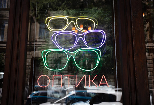 Neon Optometry Signage Displaying Eyewear