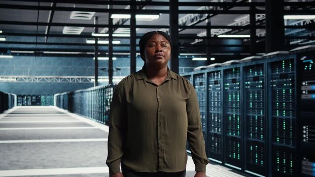Developer works inside a data center to support equipment checkups, network monitoring, infrastructure upgrades and organized technical operations within a practical data center workflow.