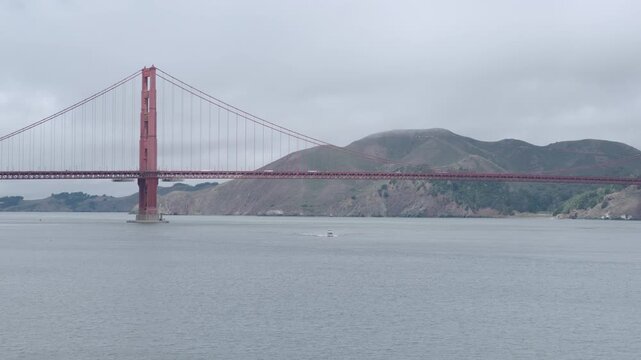 Golden Gate Bridge Wide Shot Motorboat Wake San Francisco Bay Overcast