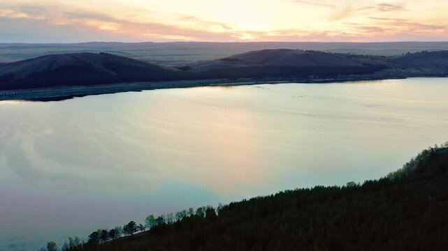 Southern Urals in spring: Irendyk ridge and Talkas Lake at sunset.