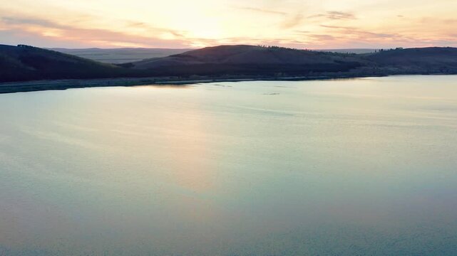 Southern Urals in spring: Irendyk ridge and Talkas Lake at sunset.
