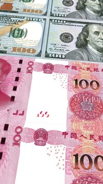 Vertical Dollar and Chinese Yuan 100 Currency Exchange Loop Background Business Finance Motion