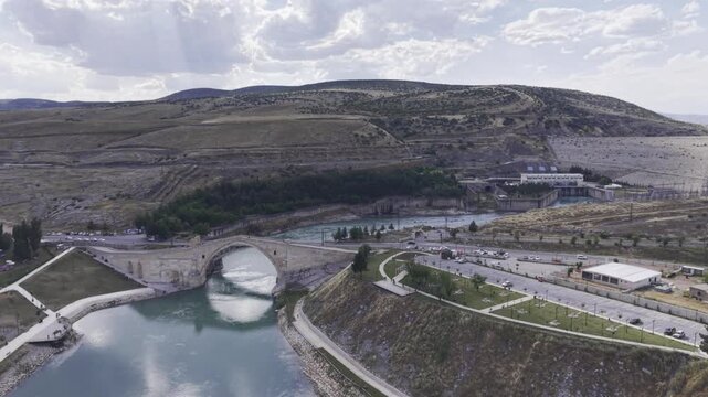 Cinematic View of Malabadi Bridge in Diyarbakir, Turkiye &ndash; Medieval Stone Arch Bridge Above Batman River