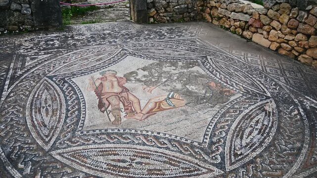 Ancient Roman mosaic floor in the archaeological ruins of Volubilis, Morocco